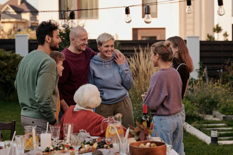 Group of people chatting in garden